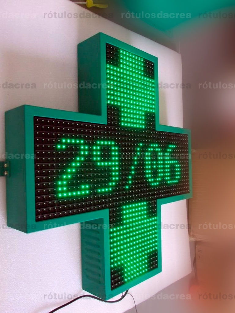 Rótulo cruz electrónica monocromo verde para farmacia